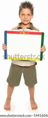 adorable seven year old boy holding blank dry erase board