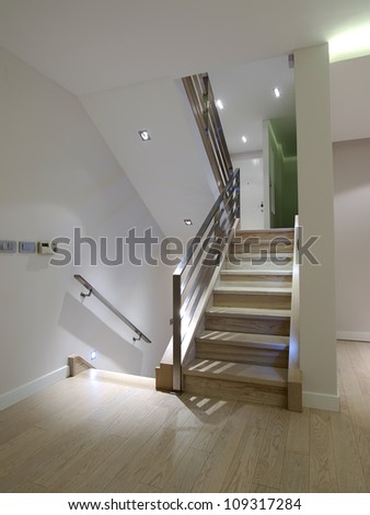 Corridor with stairs in modern apartment