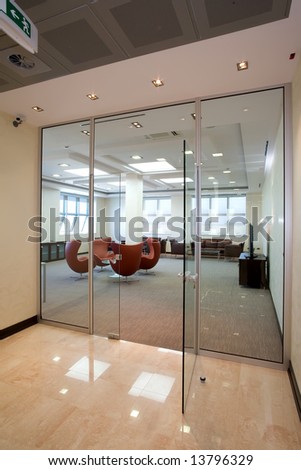 view to a meating room through glass wall