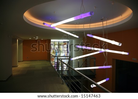 modern purple lights in dark hallway