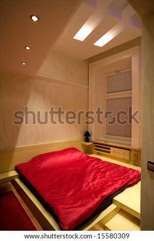 bedroom with large red bad