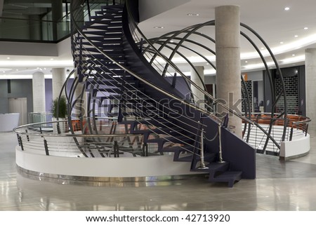 spiral metal stairs in shopping mall