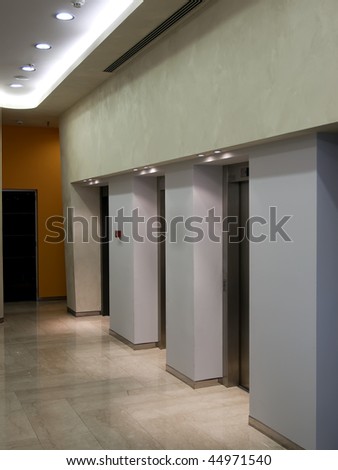 hallway with elevators