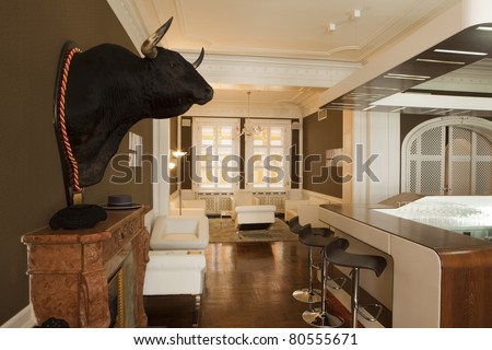 Interior of a modern restaurant with bull head mount decor