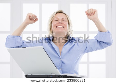 Happy woman about  business success