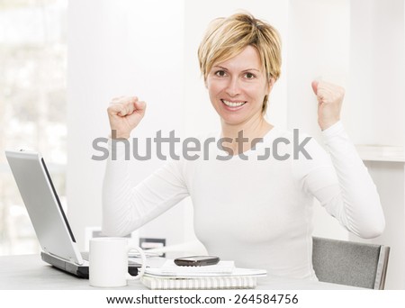 Forty years woman at work\
with positive attitude