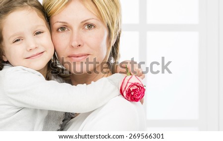 Forty years mother with her\
five years old  girl