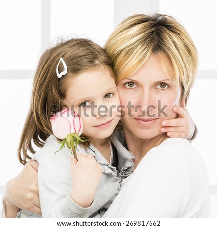 Forty years mother with her\
five years old  girl