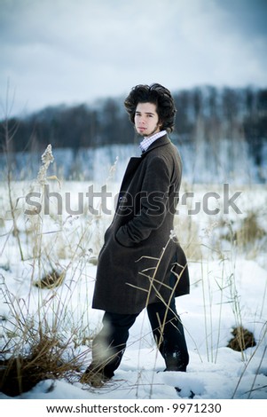The young man costs on a winter floor