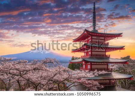 Mount Fujisan beautiful landscapes on sunset. Fujiyoshida, Japan at Chureito Pagoda and Mt. Fuji in the spring with cherry blossoms.