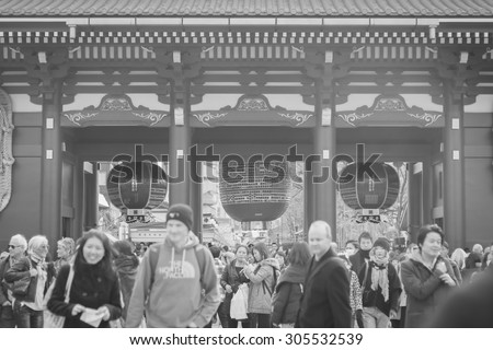 TOKYO,JAPAN - January 25, 2015  :Unidentified tourists in the Senso-ji Temple in Tokyo,Japan.The Senso-ji Buddhist Temple is the symbol of Asakusa and one of the most famed temples in all of Japan