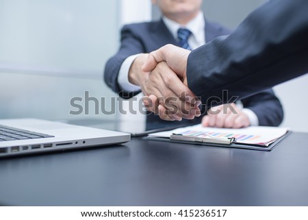 Business Man. Business handshake and business people. handshake Business concept. Shake hands after their meeting. man handshake. Shake hands in office.