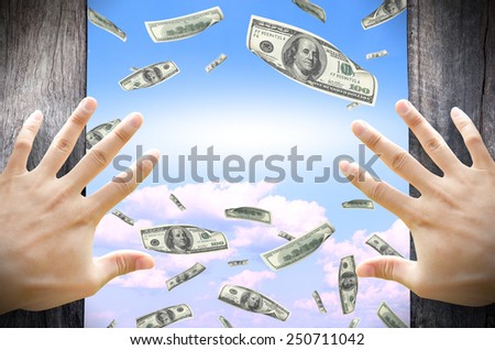 Financial Freedom concept. Opening a door and see many dollar bills floating in the sky. Leave a blank for copy space in the middle.