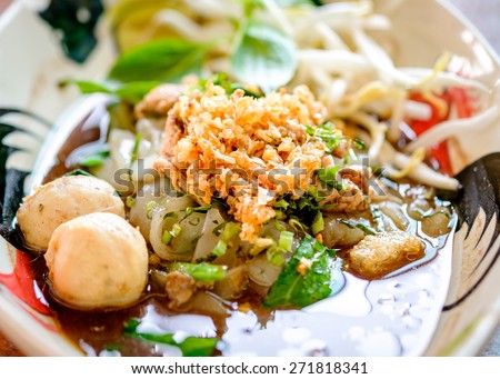Thai noodle soup (Kuay Tiew Ruer). Serve with Basil, bean Sprouts. This kind of food is very simple food as you can easy looking for every where in Thailand cost just 1-2 us dollars & very delicious.