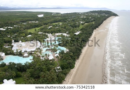 Aerial view of Port Douglas looking north along four mile beach, Queensland, Australia