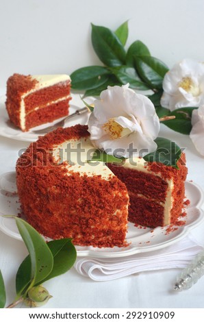 Red Velvet Cake on a Platter and on a White Wooden Background. Selective Focus