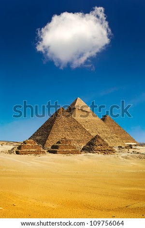 Egypt. Cairo - Giza. General view of pyramids from the Giza Plateau (the Pyramid of Menkaure /Mykerinos/, Khafre /Chephren/ and Chufu /Cheops/; three small pyramids known as Queens' Pyramids)