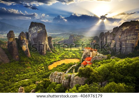 Greece. Meteora - incredible sandstone rock formations. The Holly Monastery of Rousanou and St. Nikolaos Anapafsas Monastery in background. The Meteora area is on UNESCO World Heritage List since 1988