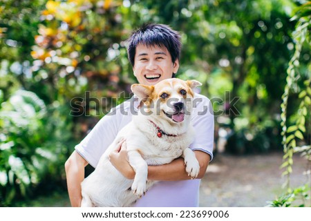 happy dog and her owner