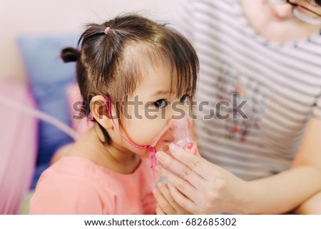 Doctor treatment a child who got sick by a chest infection after a cold or the flu that has trouble breathing and prolonged cough.A symptom of asthma or pneumonia cause by respiratory syncytial virus.