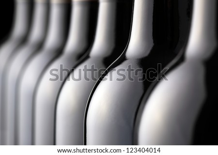 Bottles of red wine in a row