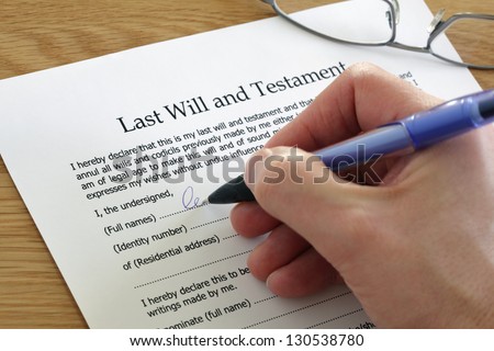 Signing Last Will and Testament document