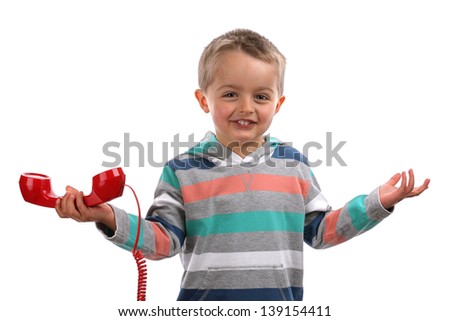 Boy shrugging and gesturing whatever with his hands after an unknown telephone call