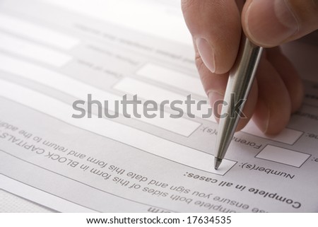 Filling out details on a contract or application form