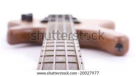 High key shot of wooden bass guitar isolated on white