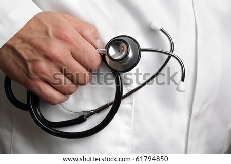 Doctor holding stethoscope ready to give medical examination