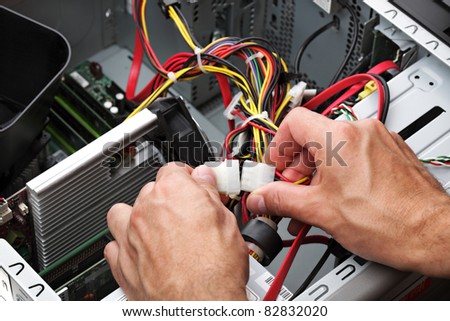 Computer engineer repairing a faulty pc