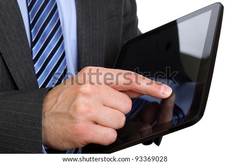 Businessman finger touching screen on tablet-pc