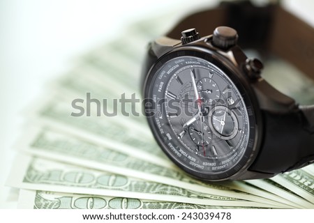 Watch and money concept for business investment or time is money