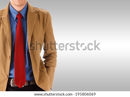 Young man in brown  fashion suit