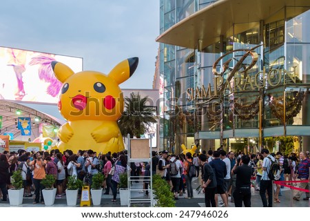 Bangkok - Jan. 11: Shoppers visit Siam Paragon mall and Pokemon Festival in the Siam Square area on Jan. 11, 2015 in Bangkok, Thailand. Siam Paragon is one of the world\'s largest malls.