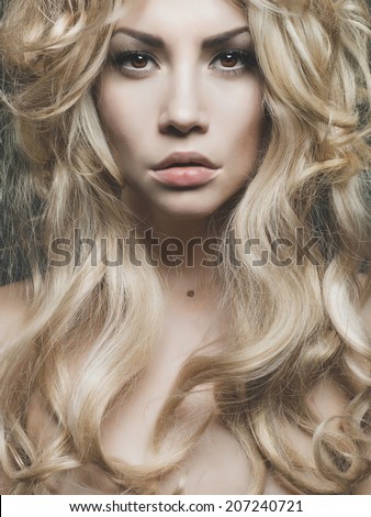 Photo of beautiful woman with magnificent blond hair. Hair Extension, Permed Hair