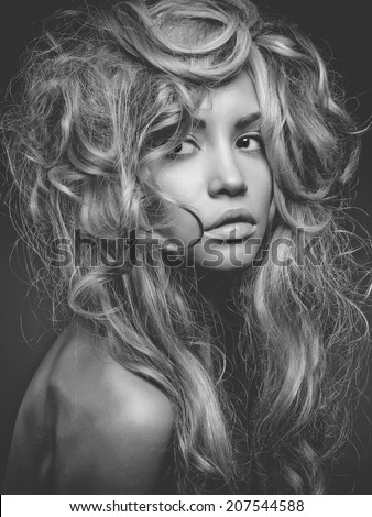 Black and white portrait of beautiful woman with magnificent blond hair. Hair Extension, Permed Hair