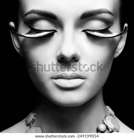 Black and white fashion portrait of beautiful lady with eyelashes