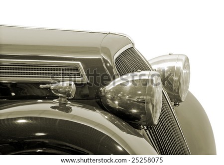 The headlight of antiquarian car isolated over white with clipping path.