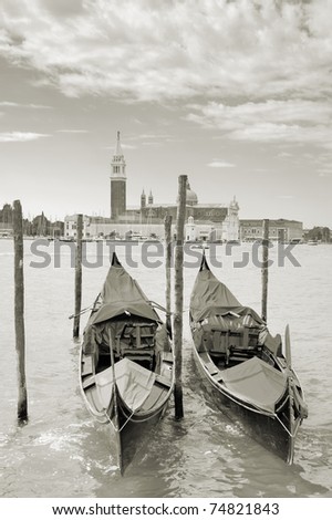 Two gondolas on the San Marco canal and Church of San Giorgio Maggiore in Venice, Italy.