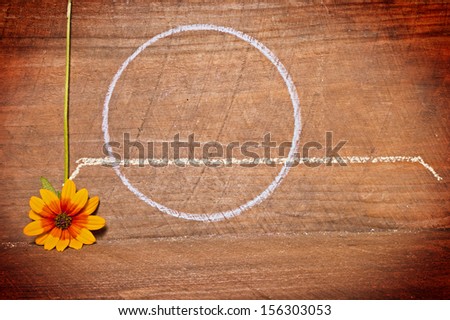 Flowers against a wooden background for texture with chalk outlines for copy space.