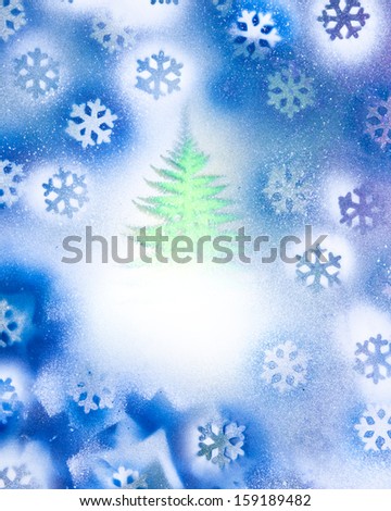 A bright green Christmas tree in a snow storm made from colorful spray paint.