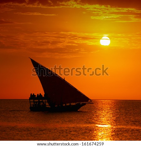 Traditional sailboat on sunset in the Indian Ocean