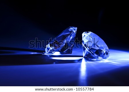 Diamonds close-up with blue ray