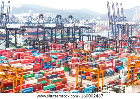Hong Kong -Oct 19: Containers At Hong Kong Commercial Port On Oct 19, 2013 In Hong Kong, China. Hong Kong Is One Of Several Hub Ports Serving More Than 240 Million Tonnes Of Cargo During The Year. .