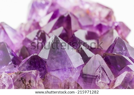 Crystal Stone, purple rough amethyst crystals on texture background.