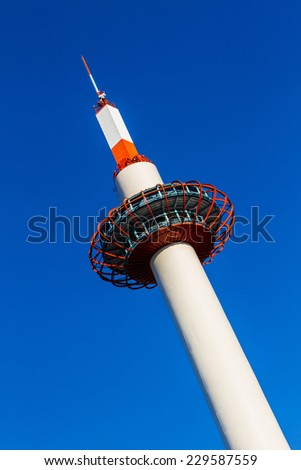 Kyoto Tower in Kyoto on blue sky background.