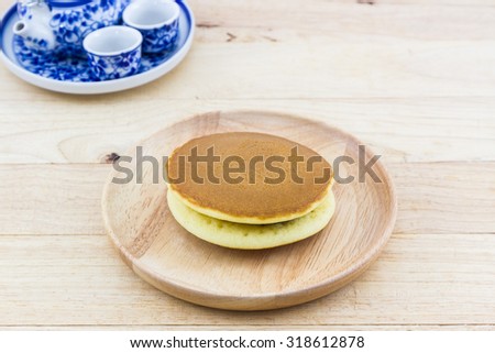Dorayaki japanese snack, dorayaki is a japanese bread, japanese pancakes on wooden table.