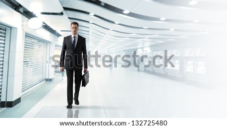 Business Man Walking In Subway