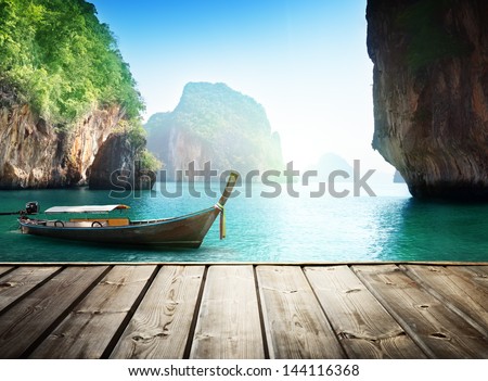 Adaman Sea And Wooden Boat In Thailand